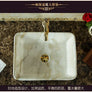 Lavabo en céramique et marbre