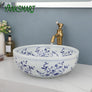 Lavabo au design chic rond en céramique - L'Atelier Imbert