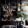 Lustre suspendu en forme de boule de verre - L'Atelier Imbert